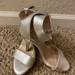 Karol Toro silver leather stilettos.